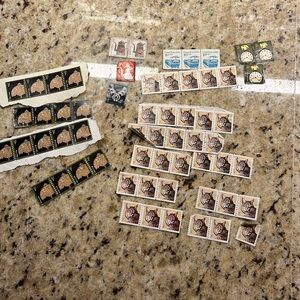 A whole lot of one cent, stamps some five some three some 10 US POSTAL SERVICE